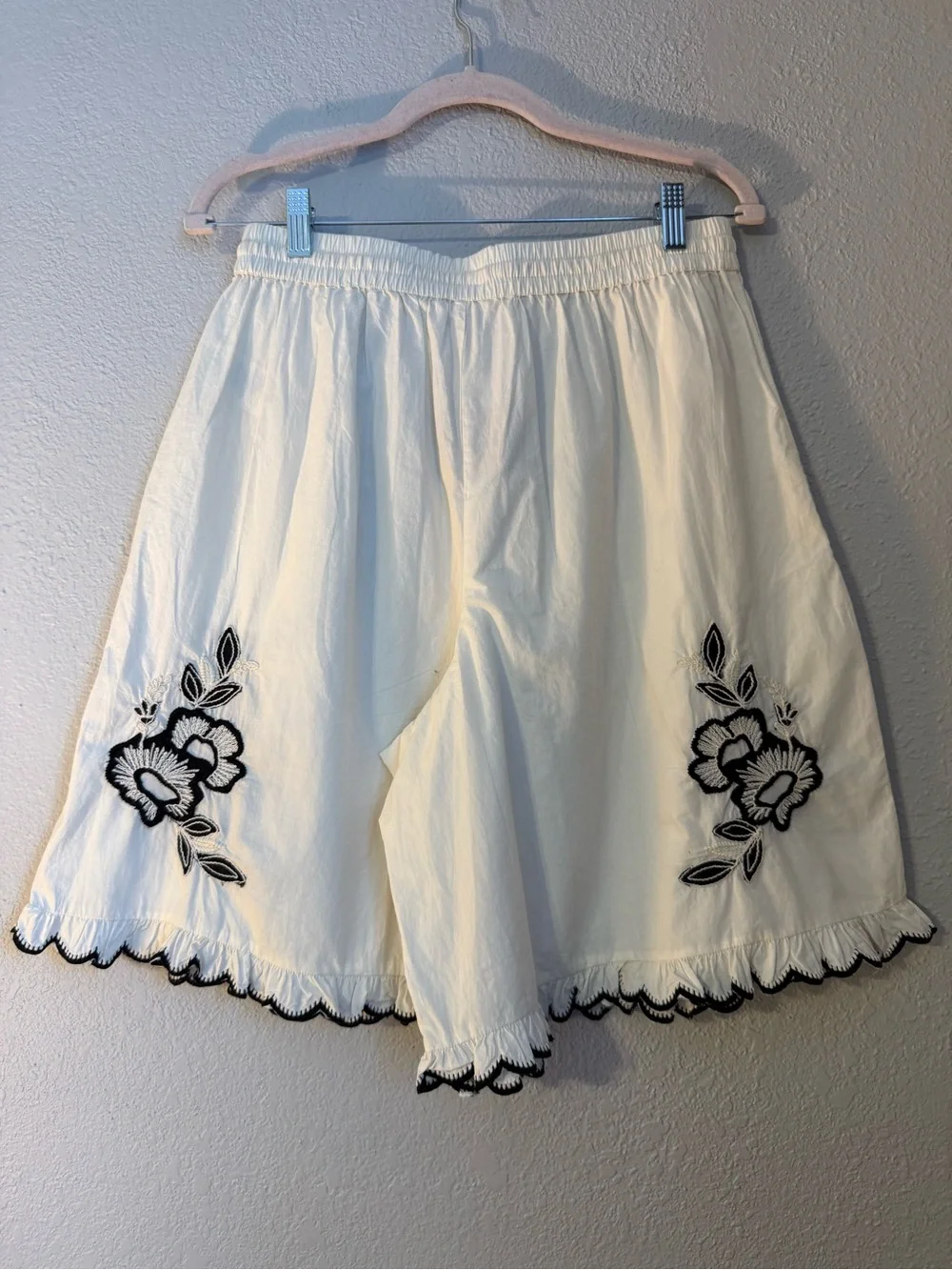 Free People Marin Short Set is crafted from ivory cotton with Black Embroidered